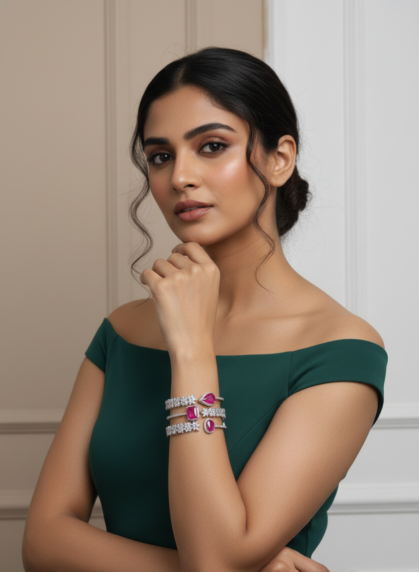 Woman wearing a green dress with jewelry against a neutral background