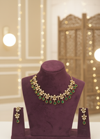 Radiant Legacy Floral Kundan Set - Antique Polish Green Stone