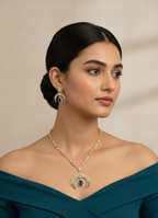 Woman wearing a necklace and earrings with a plain background