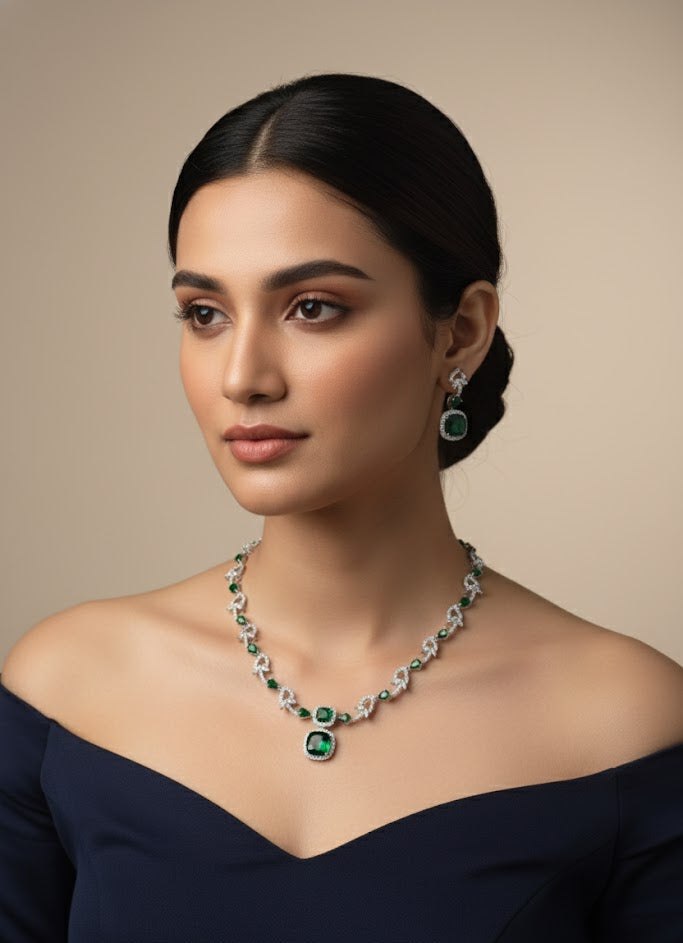 Woman wearing a necklace and earrings on a beige background