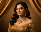 Woman wearing traditional jewelry and a gold outfit against a brown curtain background