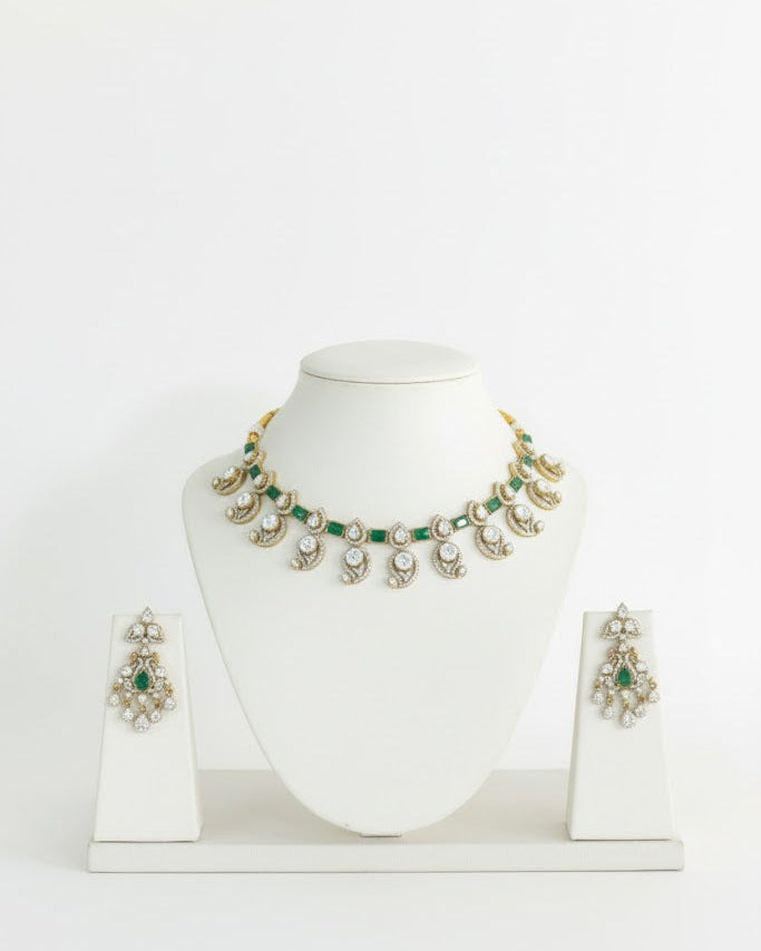 Jewelry set with necklace and earrings on a white stand