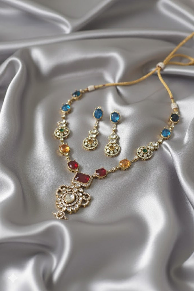 Jewelry set with necklace and earrings on a satin surface