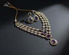 Jewelry set with necklace and earrings on a dark background