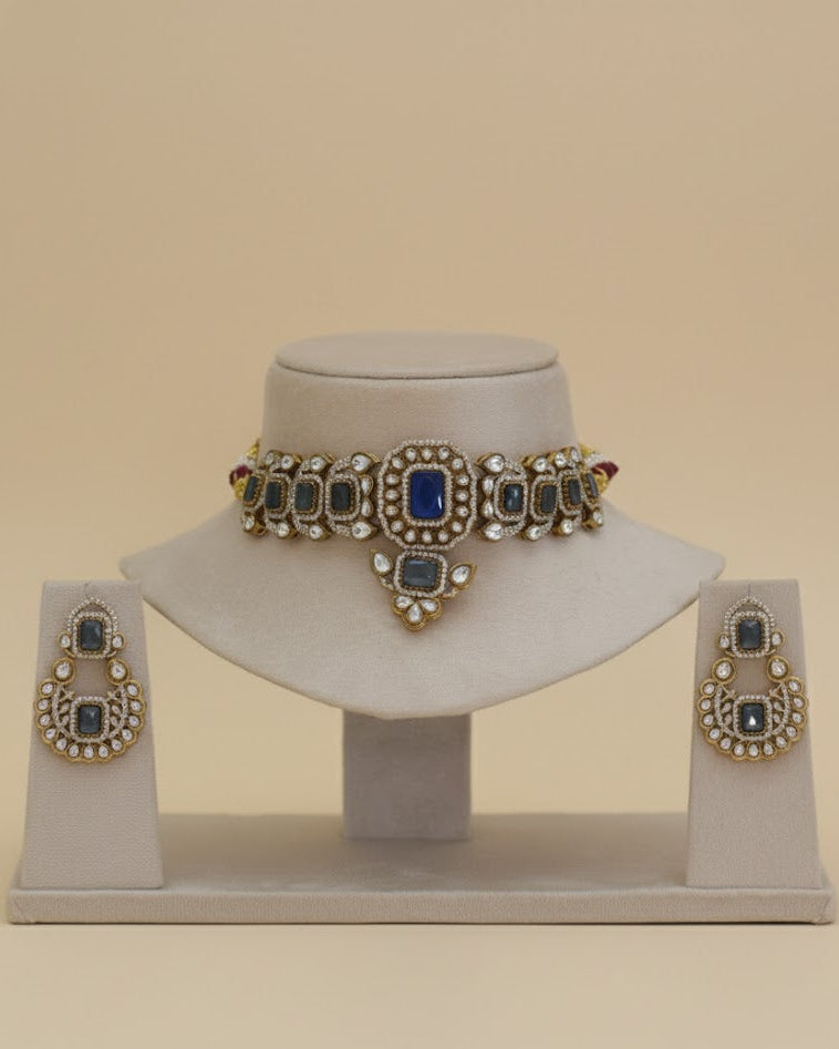 Jewelry set with necklace and earrings on a beige background